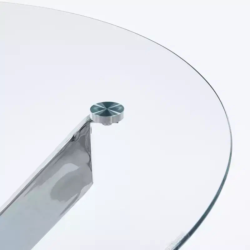 Table de salle à manger avec pieds croisés en métal et plateau en verre trempé, design moderne peu encombrant pour la cuisine ou le salon